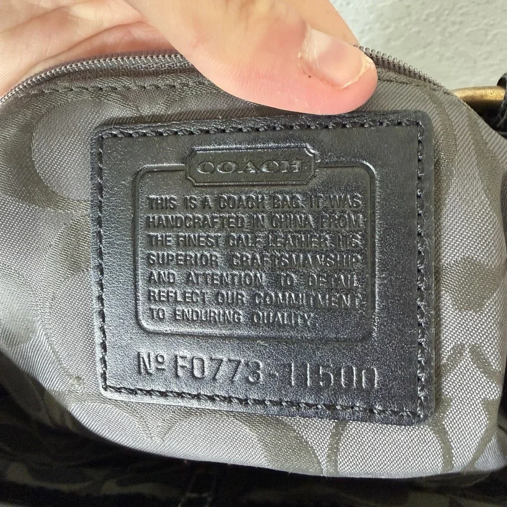 Coach Gallery Laced East West tote bag in black patent Leather Brass Hardware.